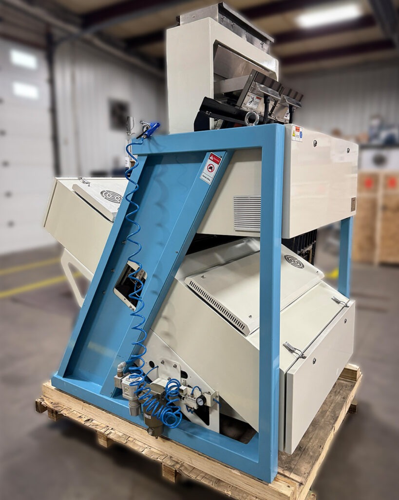 Side view of VistaSort 2-Chute Color Sorter with blue frame and attached air hose.