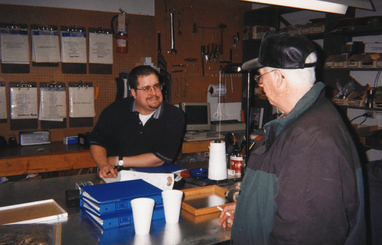 Vistasort — Chris Hammel at the parts and service counter of the Vistasort shop in Saskatoon, Saskatchewan, 1986