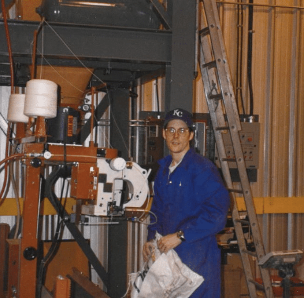 Vistasort — Steven Chivilo with Fischbein bag closing equipment at a customer site in Taber, Alberta, 1994