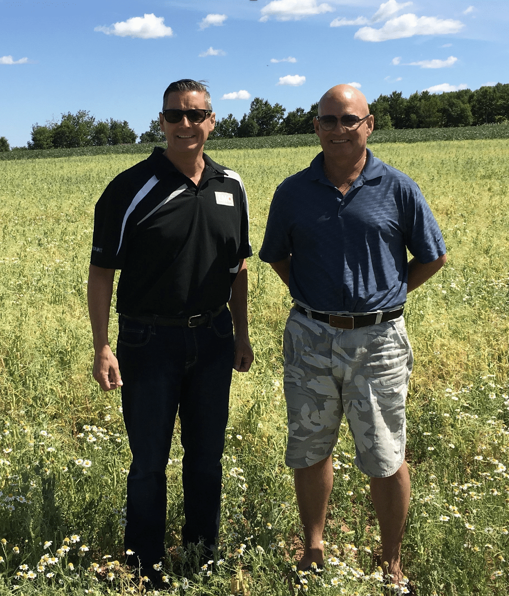 Vistasort — Steven Chivilo and his brother Chris Chivilo in a flowering field outside Red Deer, Alberta, 2016