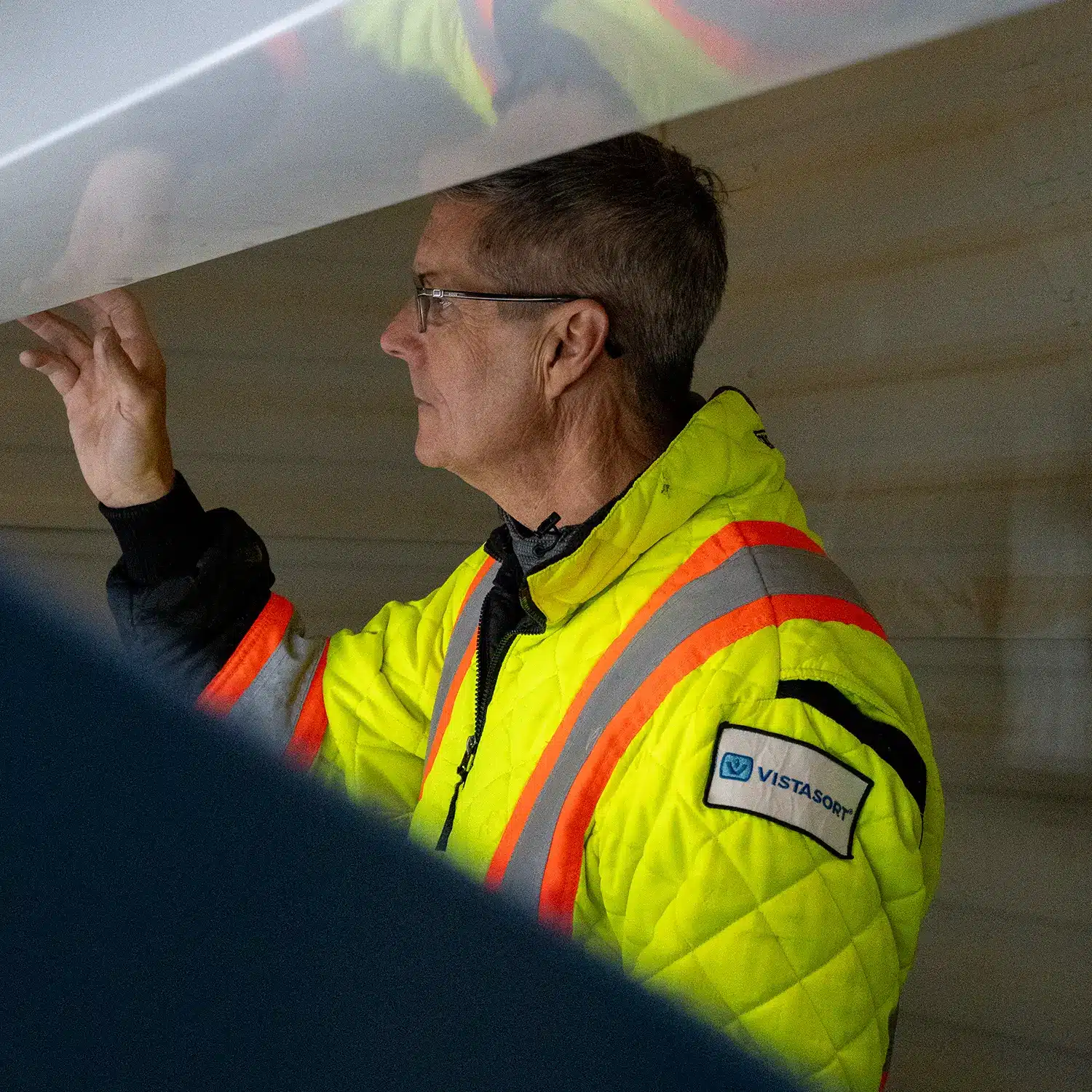 Steven Chivilo, President of Vistasort, inspecting a VistaSort optical color sorter