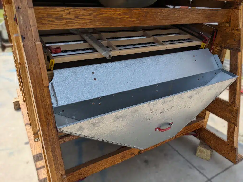 Galvanized pan under the screens of the reconditioned Clipper Super 228D