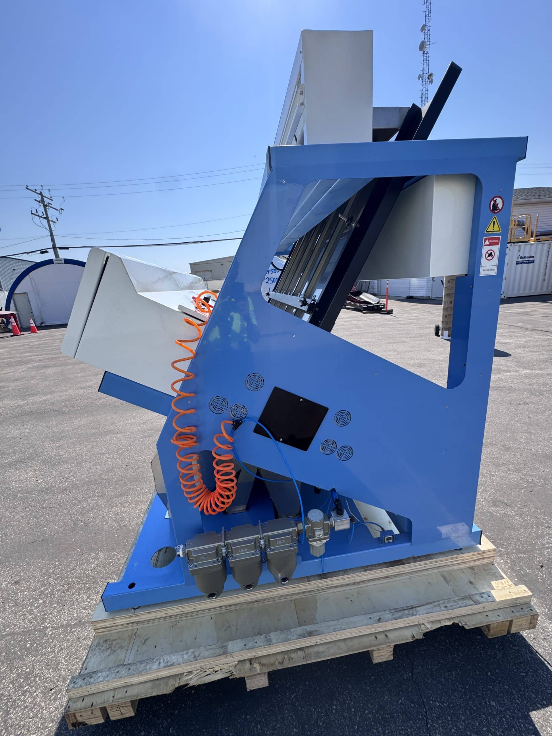 Right side of the 2020 VistaSort 5 chute color sorter with the air line and reject outlets